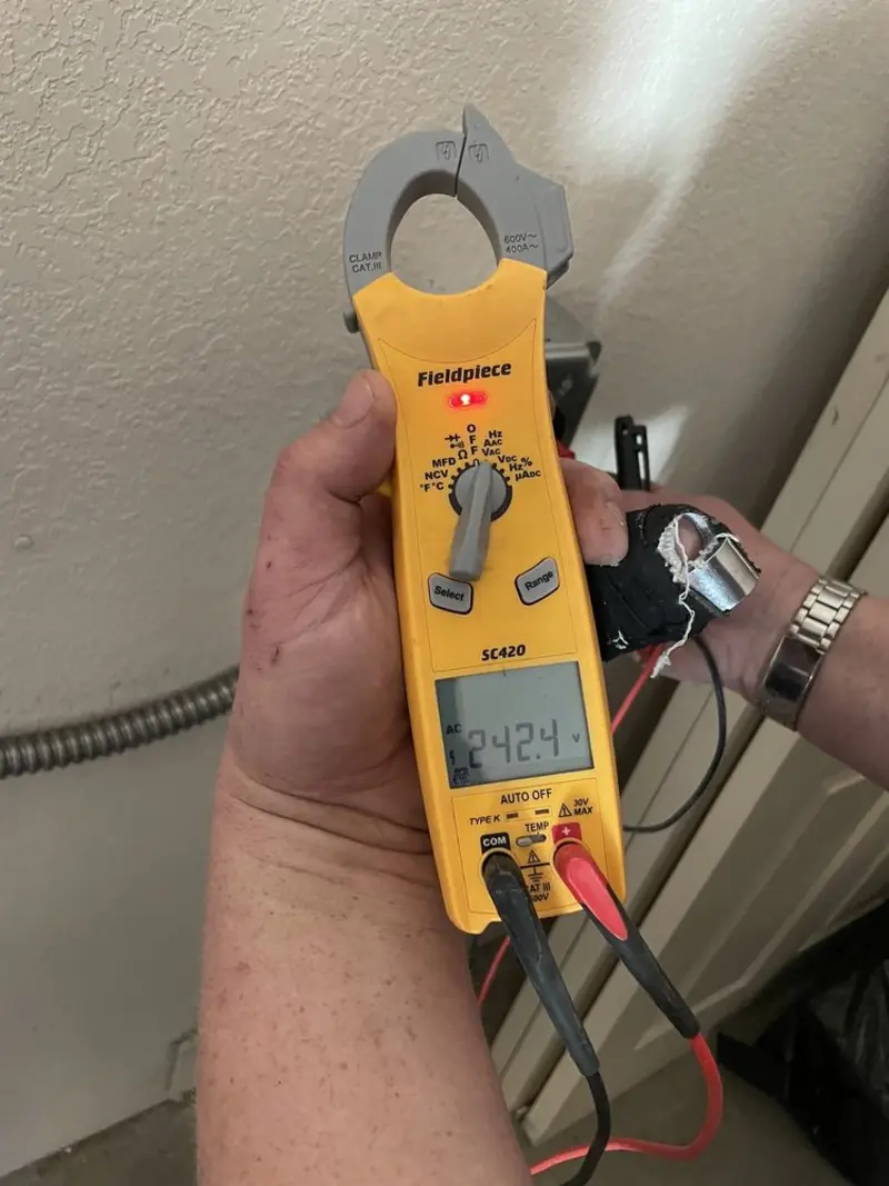 Voltage testing with clamp meter during Generator Installation in Plymouth